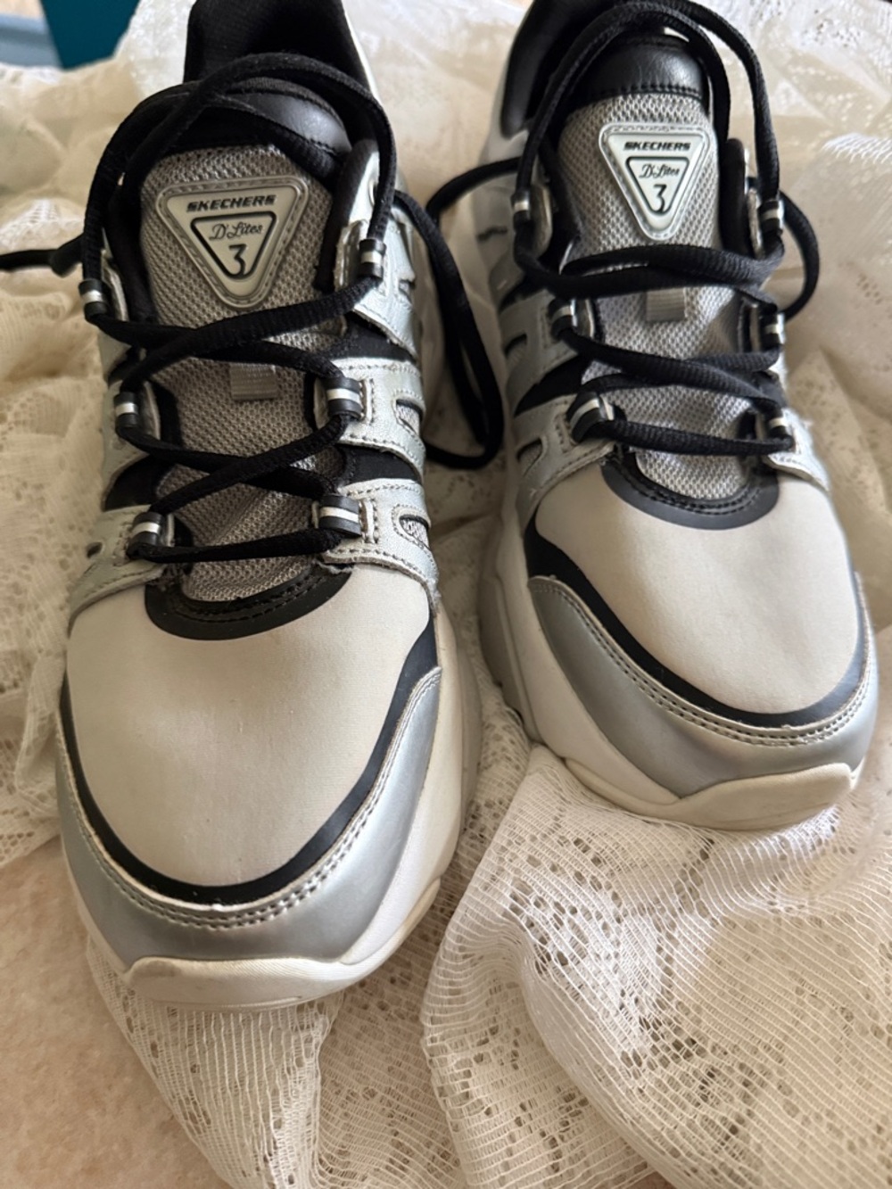Skechers silver and black athletic sneakers